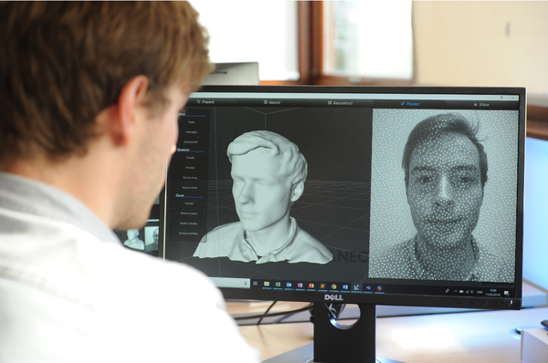 Engineer working on facial recognition